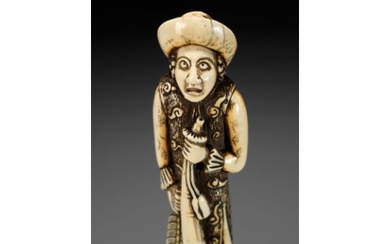 A SUPERB AND LARGE IVORY NETSUKE OF A DUTCHMAN WITH A TRUMPET