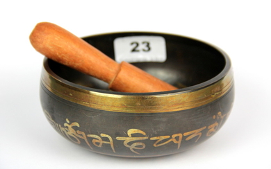 A Tibetan bronze singing bowl, Dia. 12.5cm.