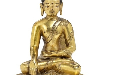 SOLD. A Tibetan gilt bronze figure of Akshobhya Buddha. 16th-17th century. Weight 305 g. H. 12 cm. – Bruun Rasmussen Auctioneers of Fine Art