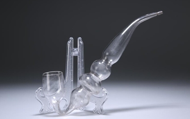 A VICTORIAN GLASS PIPE, with tapering and bulbous stem.