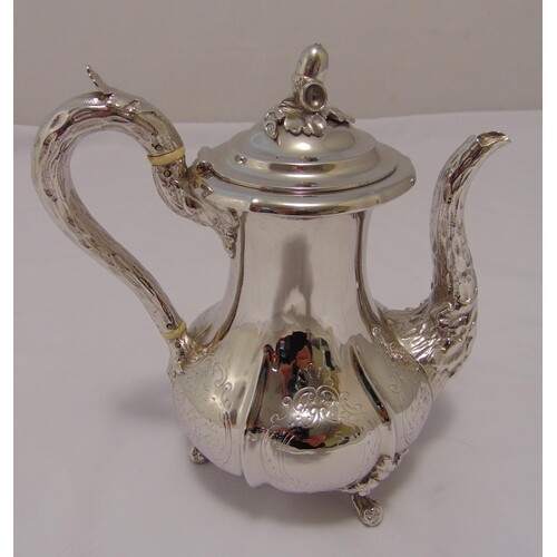 A Victorian hallmarked silver coffee pot, fluted pear shape ...