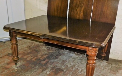 A Victorian style mahogany draw leaf dining table, with...
