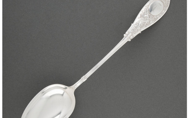 A Whiting Mfg. Co. Arabesque Pattern Silver Stuffing Spoon (designed 1875)
