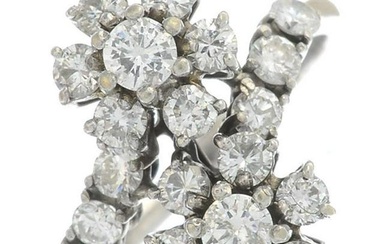 A brilliant-cut diamond double cluster ring. Estimated