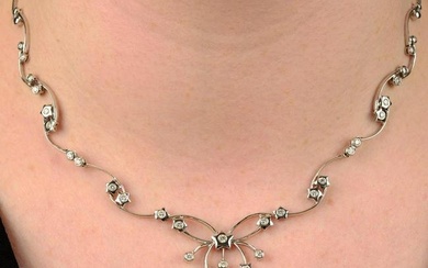 A brilliant-cut diamond star motif necklace.Estimated total diamond weight 1ct, H-I colour, VS-SI