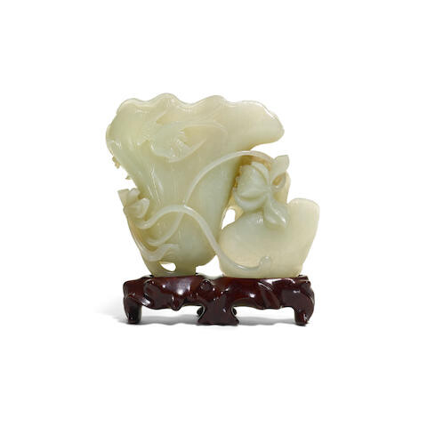 A carved jade lotus and bird group