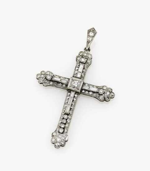 A cross pendant with diamonds