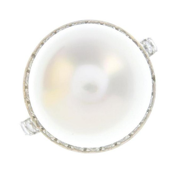 A cultured pearl and diamond cluster ring. Approximate