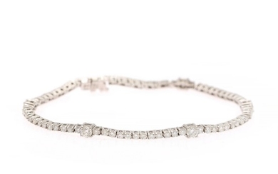 A diamond bracelet set with numerous brilliant-cut diamonds weighing a total of app. 3.00 ct., mounted in 18k white gold. G-H/SI-P1. L. 17.8 cm.