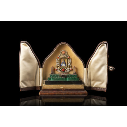 A gilt-bronze and enamel small altar depicting the Virgin with Child and Angels, decorated with coral, agate, pearl, silver and...