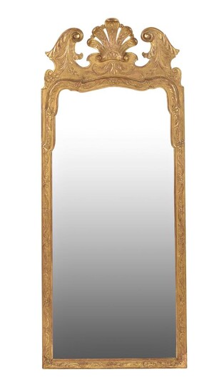 A giltwood and composition wall mirror in George I style