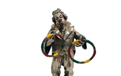 A huge solid silver and enamel figurine of a Clown with Guit...