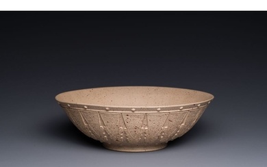 A large Chinese Yixing stoneware bowl with relief design, Qi...