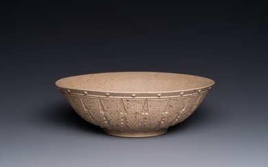 A large Chinese Yixing stoneware bowl with relief design, Qianlong mark, 18/19th C.