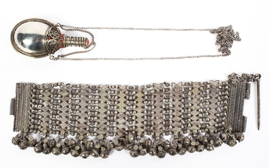A late 19th century Omani white metal chain link bracelet mounted with hanging bells, 22cm long
