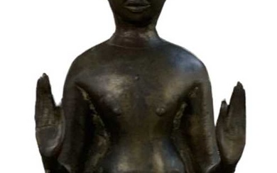 A late 19th century Thai figure of standing Buddha, raised...