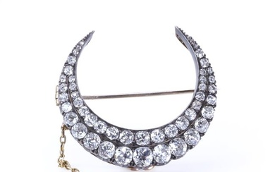 A late Victorian two row diamond closed crescent brooch, c.1890