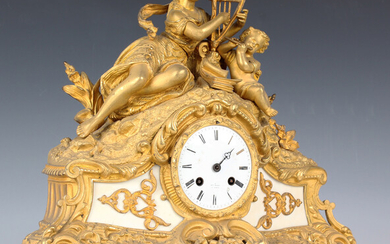 A mid-19th century French ormolu mantel clock with eight day movement striking on a bell via an outs