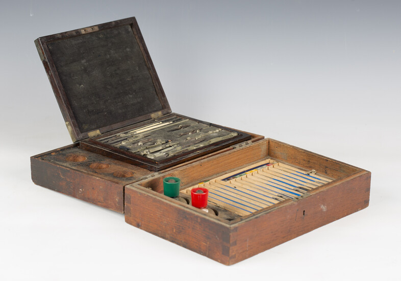 A mid-19th century drawing instrument set, within a rosewood brass bound case and outer box, a brass