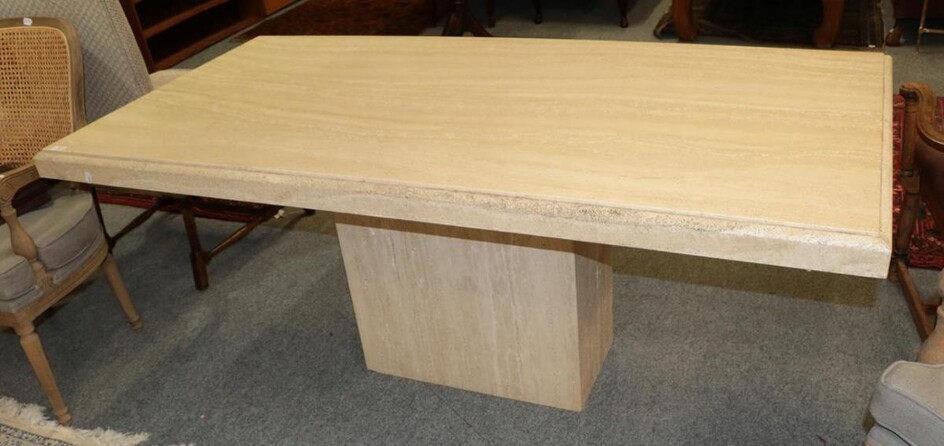 A modern travertine pedestal dining table, together with a modern...
