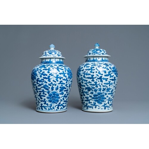 A pair of Chinese blue and white 'peony scroll' vases and co...