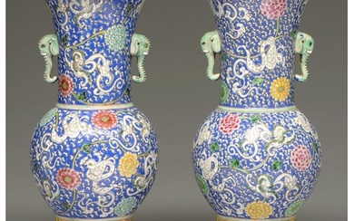 A pair of Chinese blue ground famille verte vases, 20th c, o...
