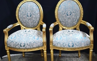 A pair of French style gilt wood upholstered armchairs 104 x 60 cm (2)