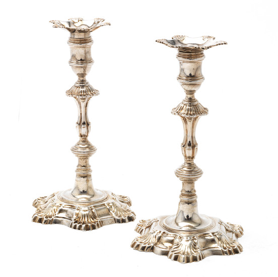 A pair of George II silver candlesticks