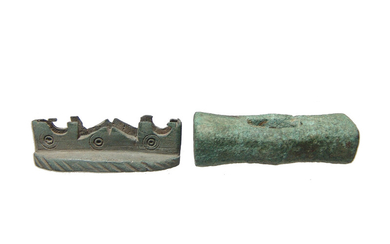 A pair of Roman bronze hilt guards