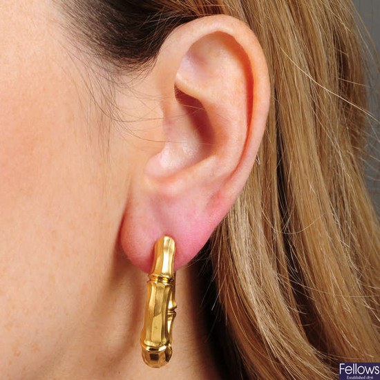 A pair of 'bamboo' earrings, by Cartier.French assay