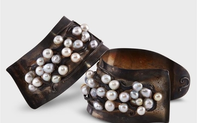 A pair of baroque cultured pearl and sterling silver...
