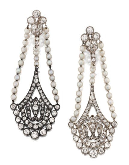 A pair of belle époque platinum, diamond and pearl drop earrings, each designed as old-brilliant-cut diamond palmette drops with rose-cut diamond points suspended from triple-row seed pearl line suspension to a diamond cluster stud top, c. 1915...