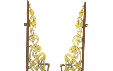 A pair of cast and wrought-iron wall brackets