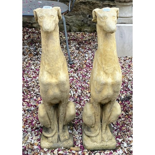 A pair of composite stone garden figures of greyhounds, 80 c...