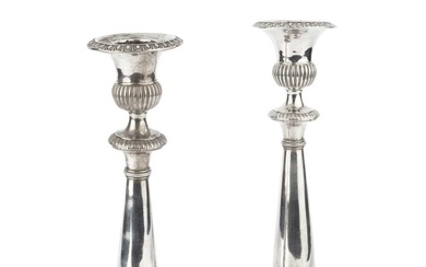 A pair of early 19th century Italian silver candlesticks, having...