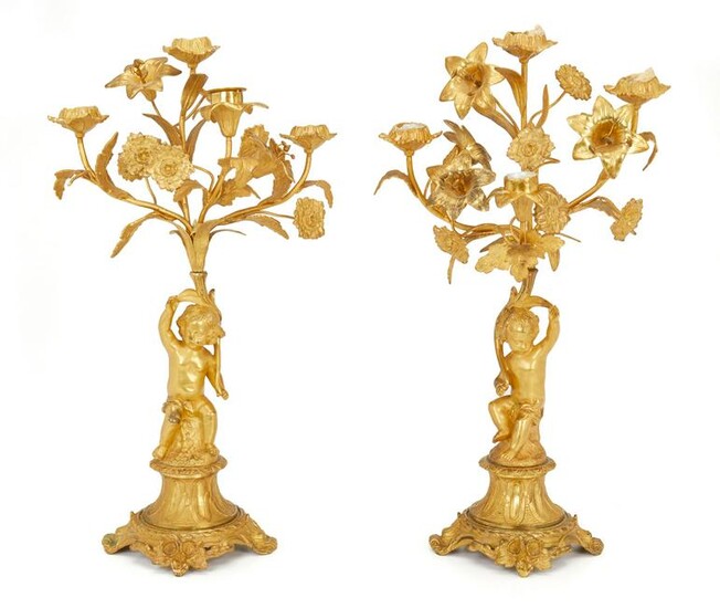 A pair of gilt-bronze candelabra