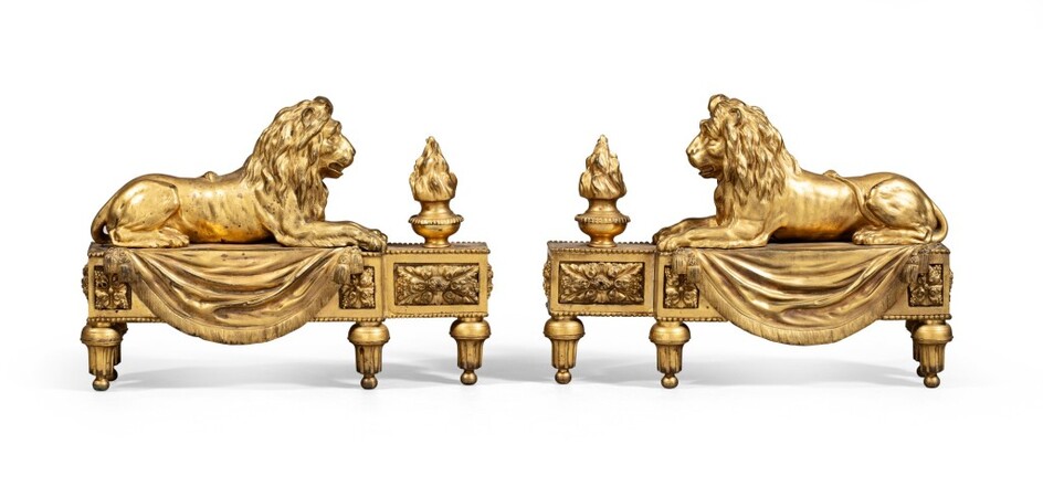 A pair of gilt-bronze fire-dogs, late 18th century - early 19th century | Paire de chenets au lion en bronze doré de la fin du XVIIIème - début du XIXème siècle