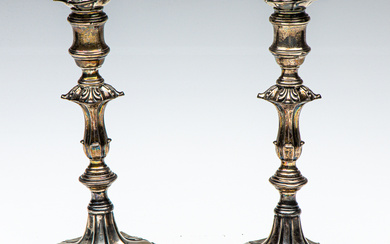 A pair of hallmarked sterling silver candlesticks (H:24cm), London c1899...