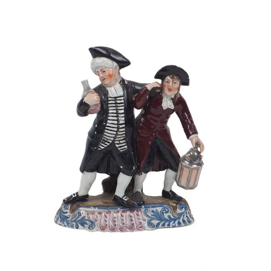 A pearlware Staffordshire figure group, 'The Parson and His Clerk', early 19th Century, of typical form with the drunken parson led by the hand, his clerk holding a lantern, polychromed on a blue and pink flourish base, 22cm high overall (AF)