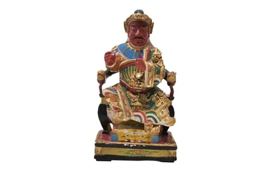 A polycrom varnished and gilded wooden figure by Guandi, | Eine polycrom lackierte und vergoldete Holzfigur von Guandi