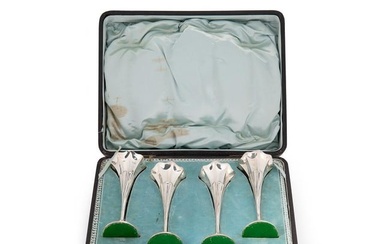 A set of four Edward VII silver spill vases in a fitted case