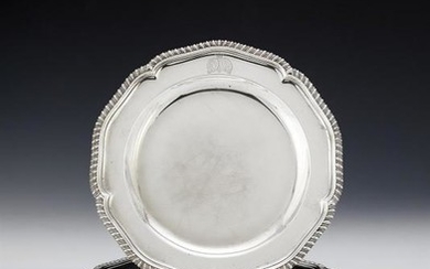 A set of twelve George III silver dinner plates by Robert Sharp