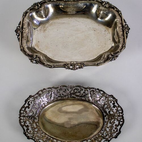 A silver bread basket and silver tray