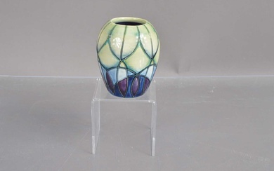 A small Moorcroft pottery vase in 'Indigo' pattern