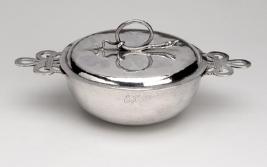 A small silver dish with cover