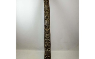 AFRICAN DOOR LINTEL, with repeat figural carving, 185cm H.