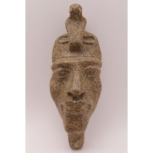 AN EGYPTIAN GRANITE CARVED MASK OF AKHENATEN, after the anti...