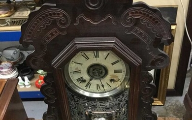 American mantel clock in carved wood case