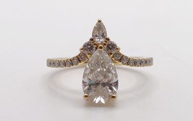 An 18ct gold and lab grown pear shaped diamond ring, ring si...