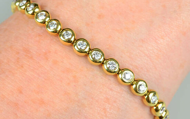 An 18ct gold brilliant-cut diamond collet bracelet, by Tiffany & Co.